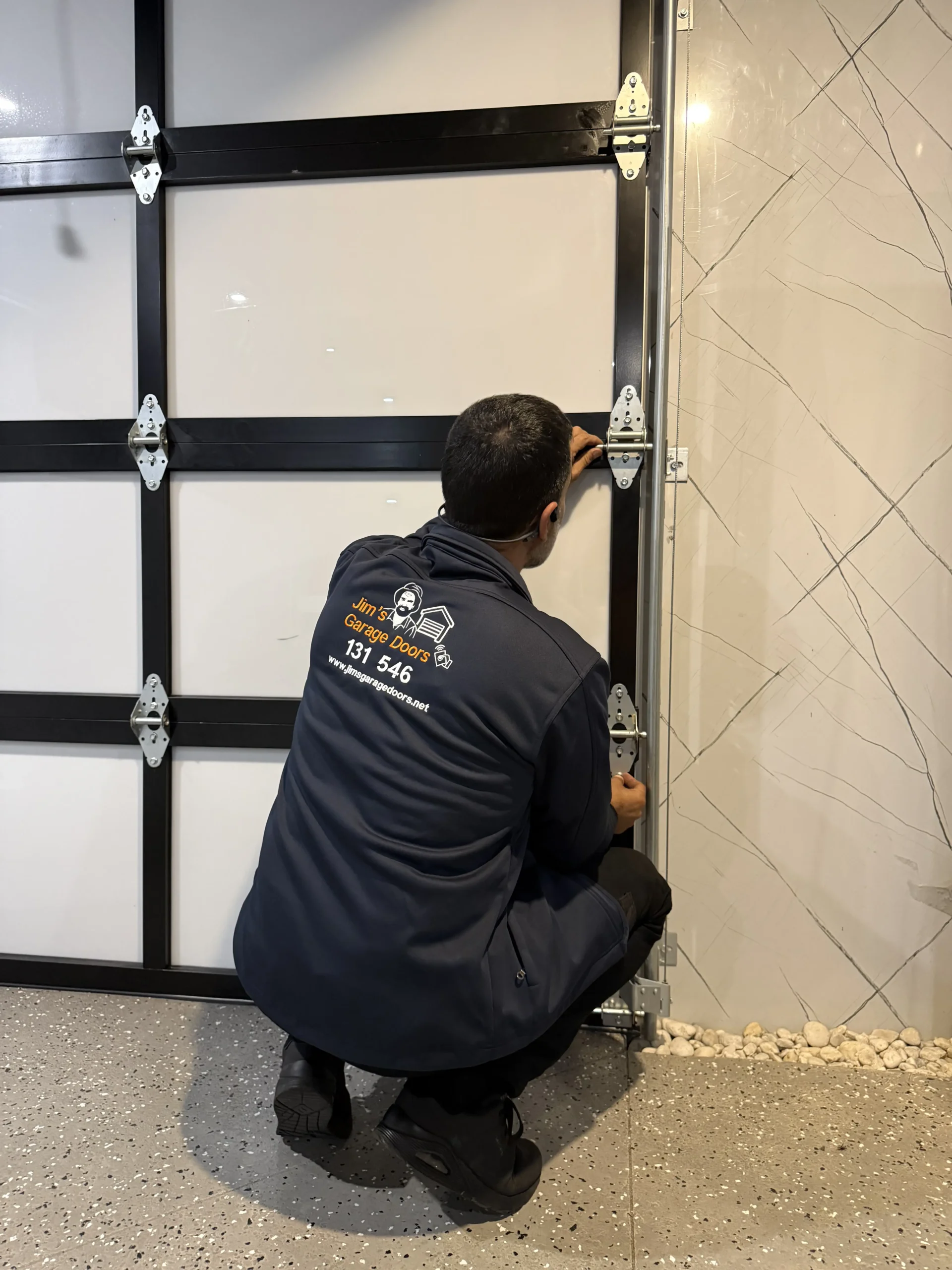 Professional garage door roller wheel adjustment