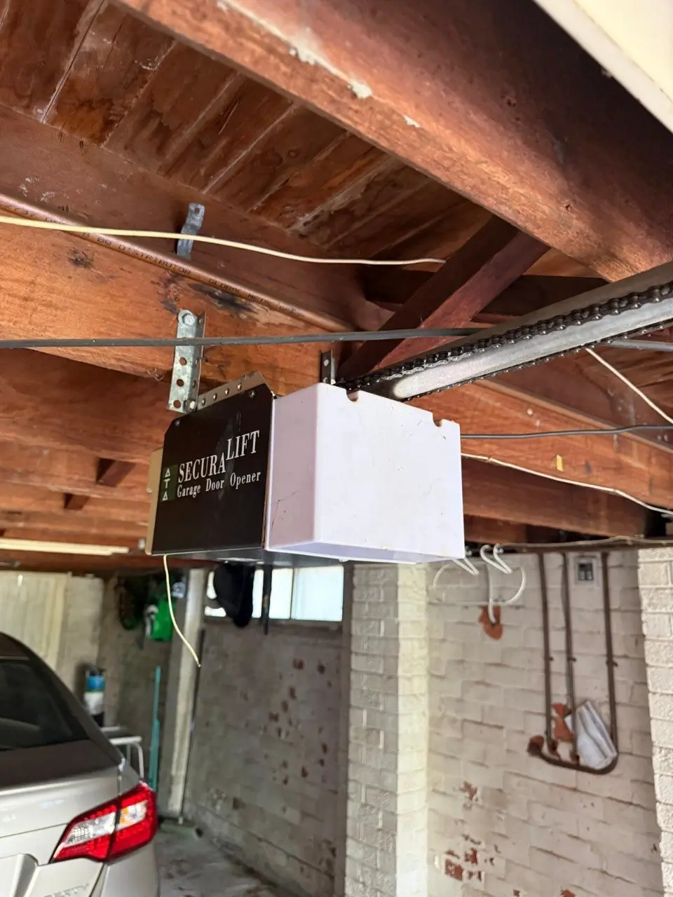 Inspection of chain drive garage door opener motor